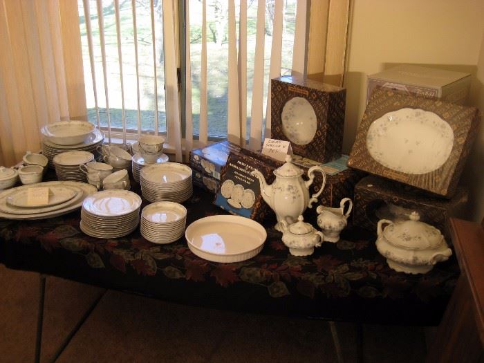 China dishes and formal dining dishes some new in boxes. 