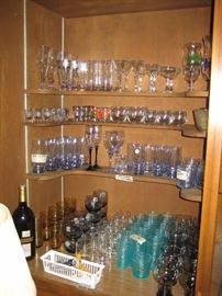 Complete bar with variety of glasses and bar accessories. 