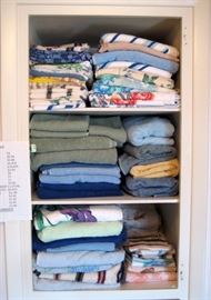 Closets full of linens, towels and blankets. 