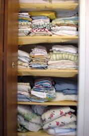 Closets full of linens, towels and blankets. 
