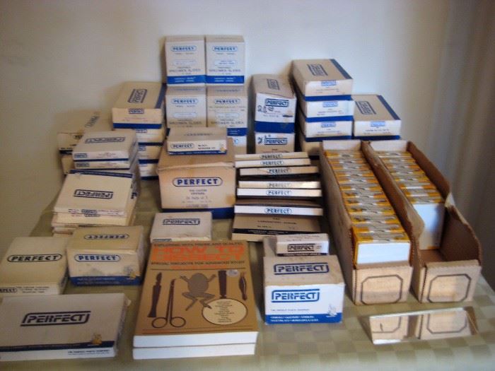 Boxes full of Perfect blank and pre-prepared glass slides and covers- lights – gloves - aprons dissection kits - lab accessories most new in boxes. 