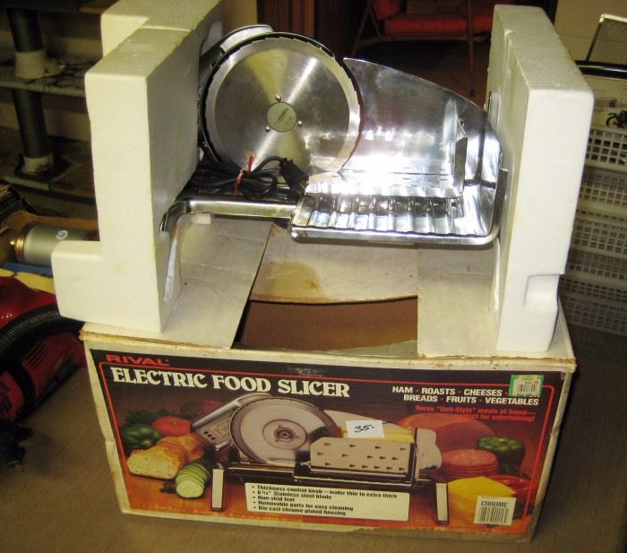 RIVAL meat slicer like new in the box. 