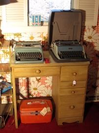 Vintage typewriters and small desk.