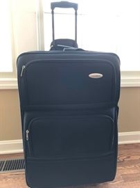 Brand New with tags Samsonite Black Luggage with wheels.           https://www.ctbids.com/#!/description/share/17370