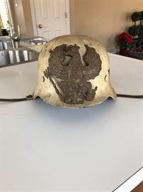 Vintage German Helmet with Emblem      https://www.ctbids.com/#!/description/share/17369