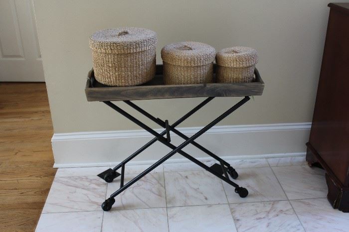 Metal folding table with three graduated size baskets