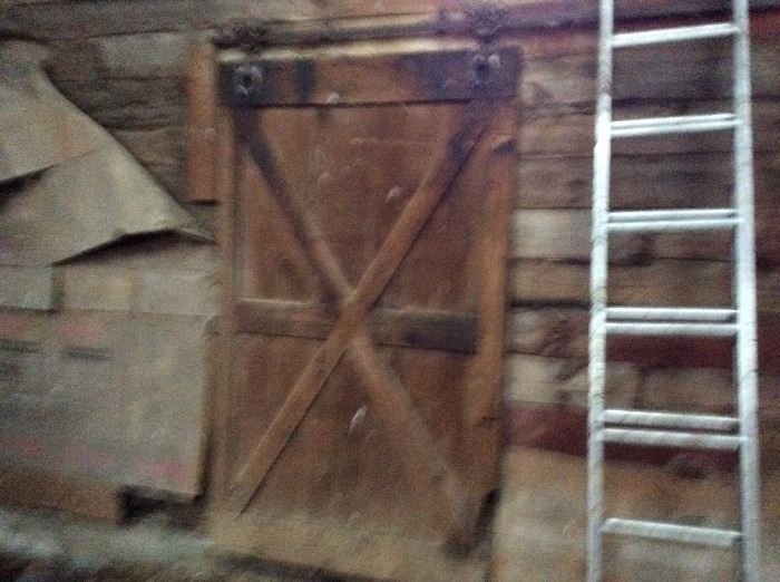 One of 3 barn doors on antique sliders