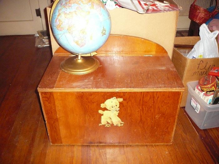 world globe and wooden toy chest