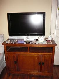 Vizio LCD tv and mission style entertainment stand 