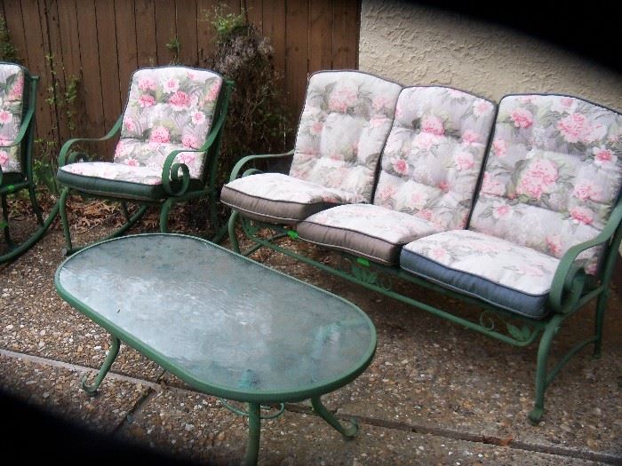 sofa, two rocking chairs and coffee table.  Some seat straps need replacing.