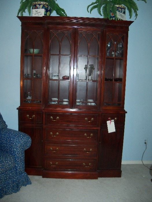 mahogany breakfront (top drawer opens like a secretary.  Inside, misc glass and china