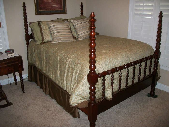 Antique Cherry Bedroom Suite with bedspread and some pillows