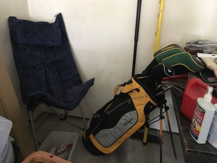 Gold clubs and comfy folding chair