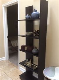 Black shelving with decor