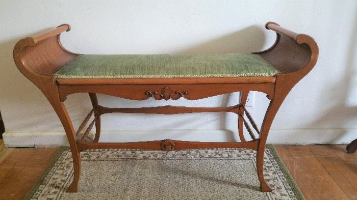 Oak bench with upholstered seat