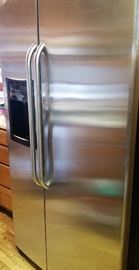 GE stainless steel ice and water in the door side by side fridge