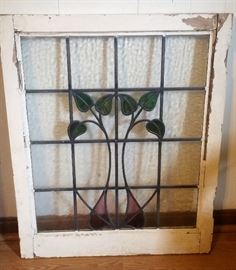 One of two stained glass windows with frame