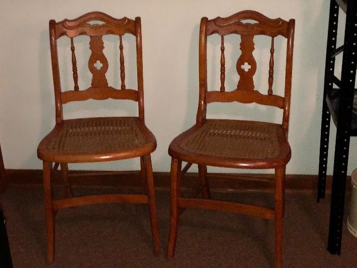 Pair of oak caned chairs 