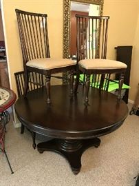 Round dining room table (with leaf to become oval) with Four Chairs