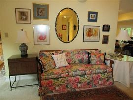 Cane back sofa w/cushions.