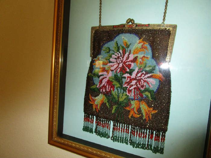 Framed antique beaded purse.
