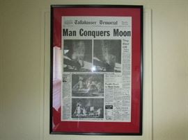 Framed Tallahassee Democrat newspaper of the Moon landing.