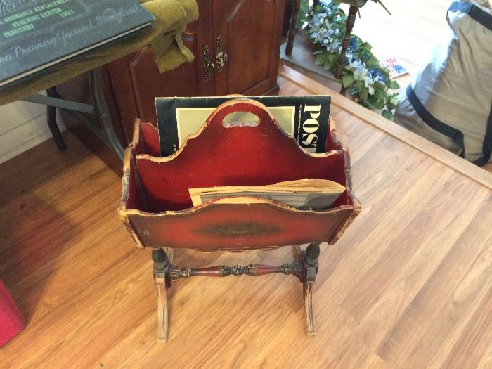 Vintage magazine rack with Kennedy and Johnson articles.