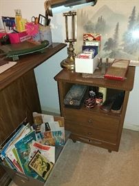 end table, vintage ephemera, shoe shine, cards, desk lamp