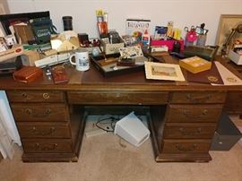 office desk, office supplies, money bags