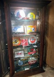 curio cabinet tin airline advertisements model cars model trains