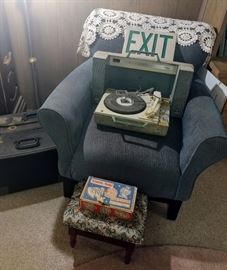 accent chair foot stool exit sign vintage portable record player vintage document bags