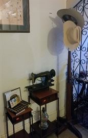 coat rack cowboy hats singer sewing machine antique accent tables