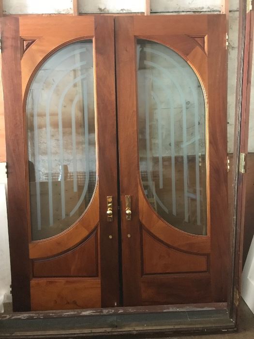 Custom mahogany entry doors,  6’ w  x. 8’ high 2-3:4” thick, Baldwin mortised lockset. 