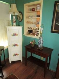 Painted chimney cupboard, table/desk, lamps, collectible figurines