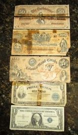 Antique/vintage currency, 50 and 100 bills are rough