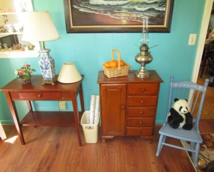 Misc tables/chests, painted child's rocking chair, kerosene lamp, electric lamps, baskets