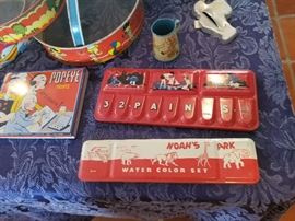 huge collection of colorful tin litho paint boxes