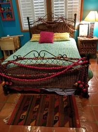 Wicker and iron bed