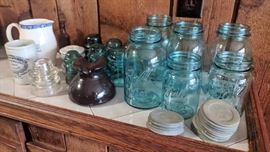 Glass insulators and blue Ball mason jars