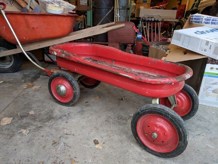Vintage red metal wagon