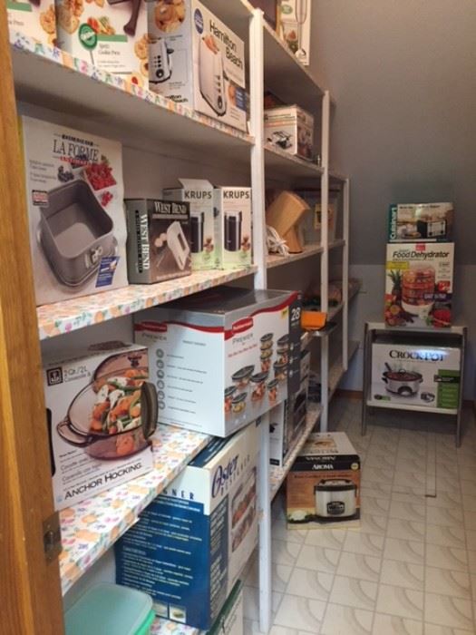 Pantry filled with new in-the-box kitchen appliances