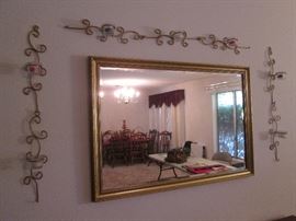 Various Wall-mounted Art and Sconces throughout the home.