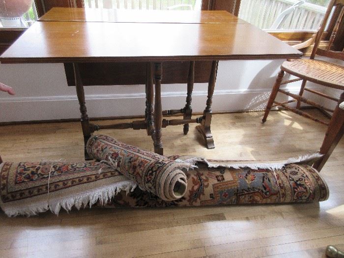 Gate leg table and wool area rugs