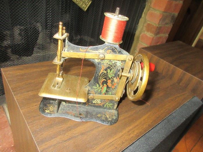 Antique child's sewing machine #53486