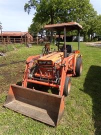 Kobota Front Loader and several attachments tiller brush hog box blade