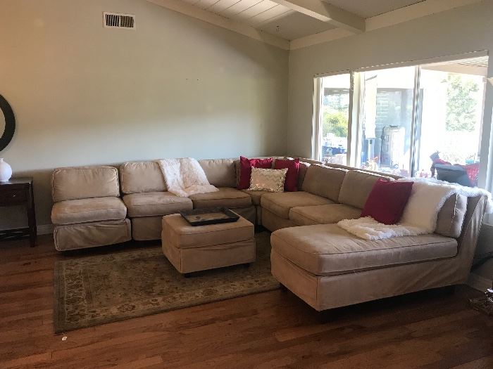 Pottery Barn sectional- two love seats, one corner piece, single chair with ottoman, lounge - can be connected together or used separately.  Slipcovered.