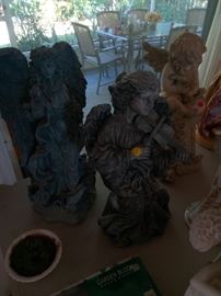 Lawn ornaments and resin statues. $5 and up