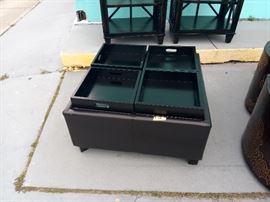 Square coffee table that the tops flip over for cushions. At my overflow shop 1000 Aurora Road Melbourne $85