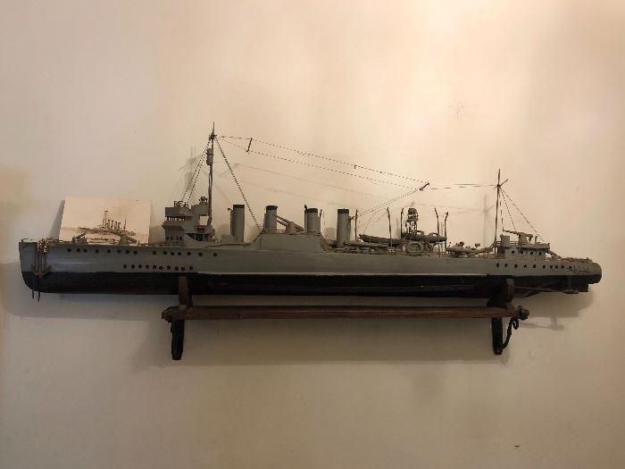 Vintage U.S.S. Colorado model ship with intricate detail. The grandfather of this family was assigned to this ship. Available for sale at this sale is his uniform and other pieces related to his military service.
