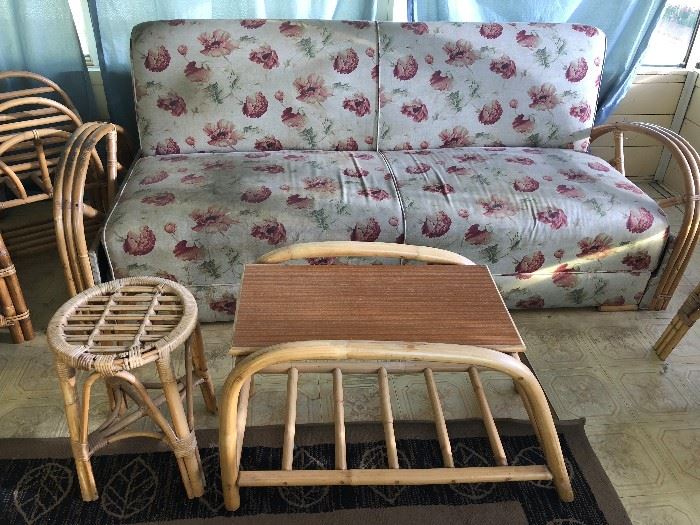Vintage Mid Century Modern rattan bamboo Hawaiian sofa with pullout bed, pretzel coffee table and small round side table
